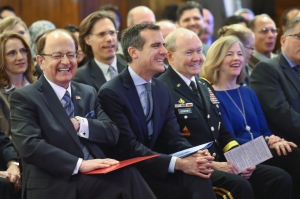 (left to right) USC President C. L. Max Nikias, Los Angeles Mayor Eric Garcetti, Joint Chiefs of Staff Chairman Gen. Martin Dempsey and wife Deanie Dempsey react to comments from Anthony Hassan, clinical professor at the USC School of Social Work during the general's visit to USC to talk about veteran affairs, Monday, March  23, 2015. (USC Photos/Gus Ruelas)